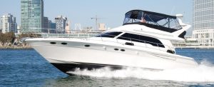 A white yacht of San Diego private yacht charters in the bay of San Diego, CA.