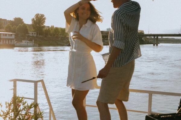 A couple celebrating in private yacht of bay experience's yacht charter in San Diego