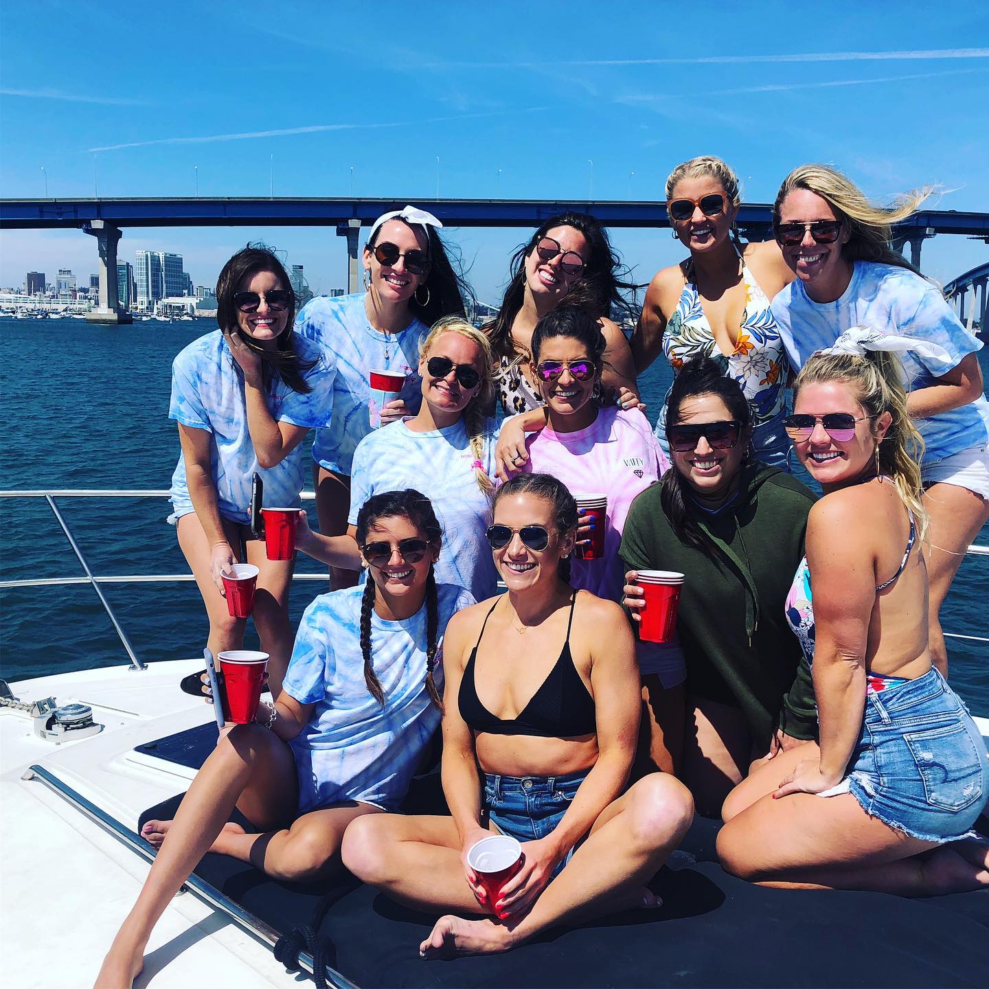 A picture of a bachelorette pose in the in the yacht of Bay Experience's Boat yacht charter